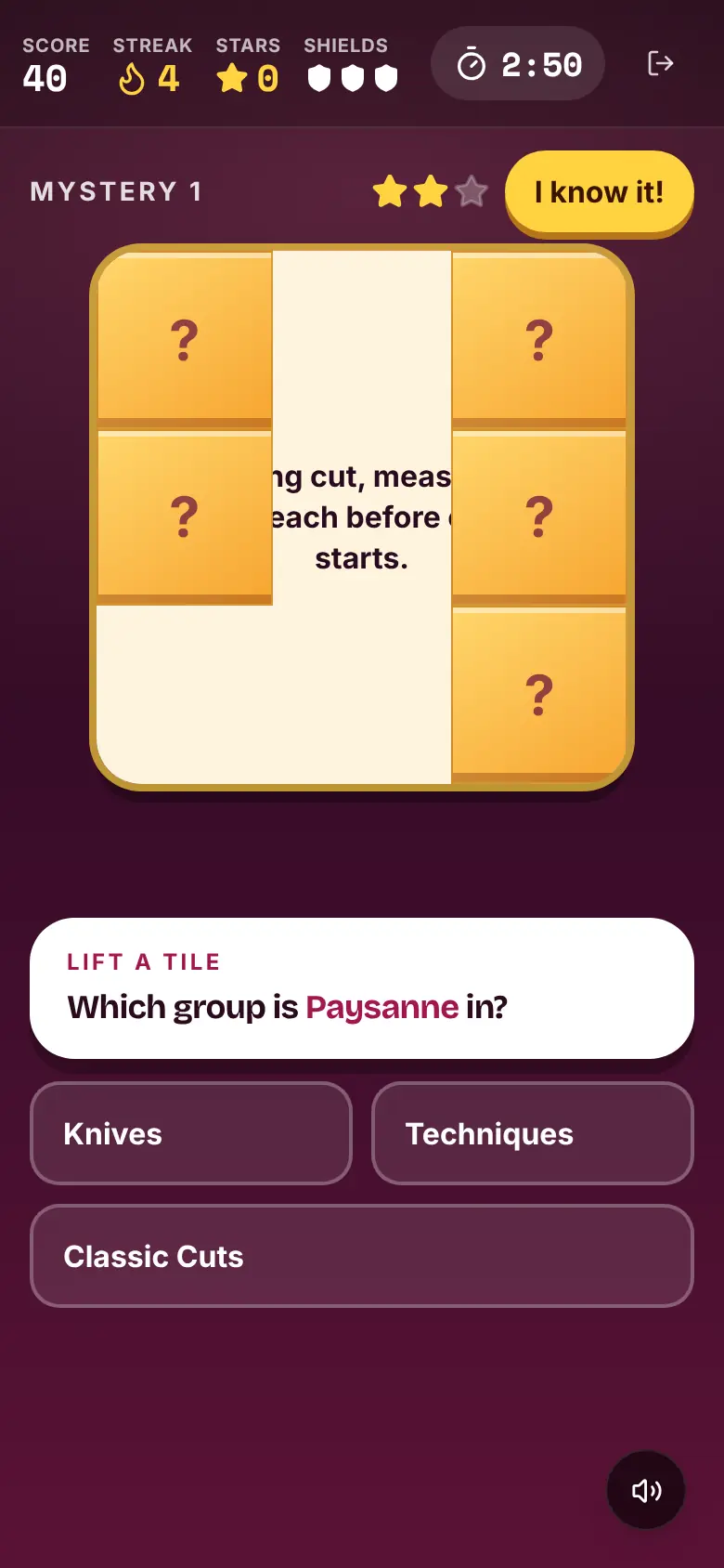 Mystery Reveal on a phone: a grid of gold tiles with three lifted off the hidden term, a question card and three group buttons.